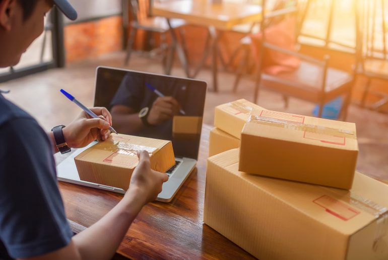 Temando is Shutting Down. Here’s How ShipperHQ Can Help. Delivery driver picking up shipment from eCommerce retailer's location