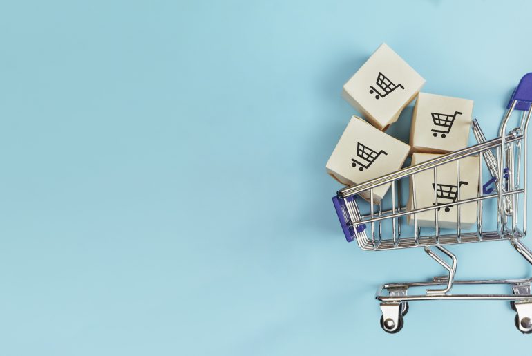 Top 2020 Retail Trends for the Customer Experience shopping cart with blue background about 2020 retail trends