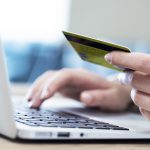 customer on computer on a shopify checkout