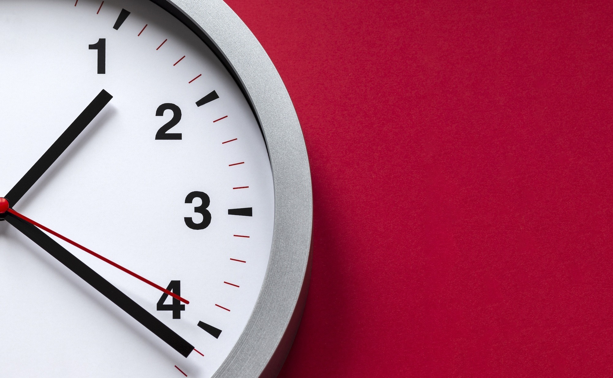 Shipping Lead Times: What You Need to Know to Get Orders to Customers on Schedule clock face on red background