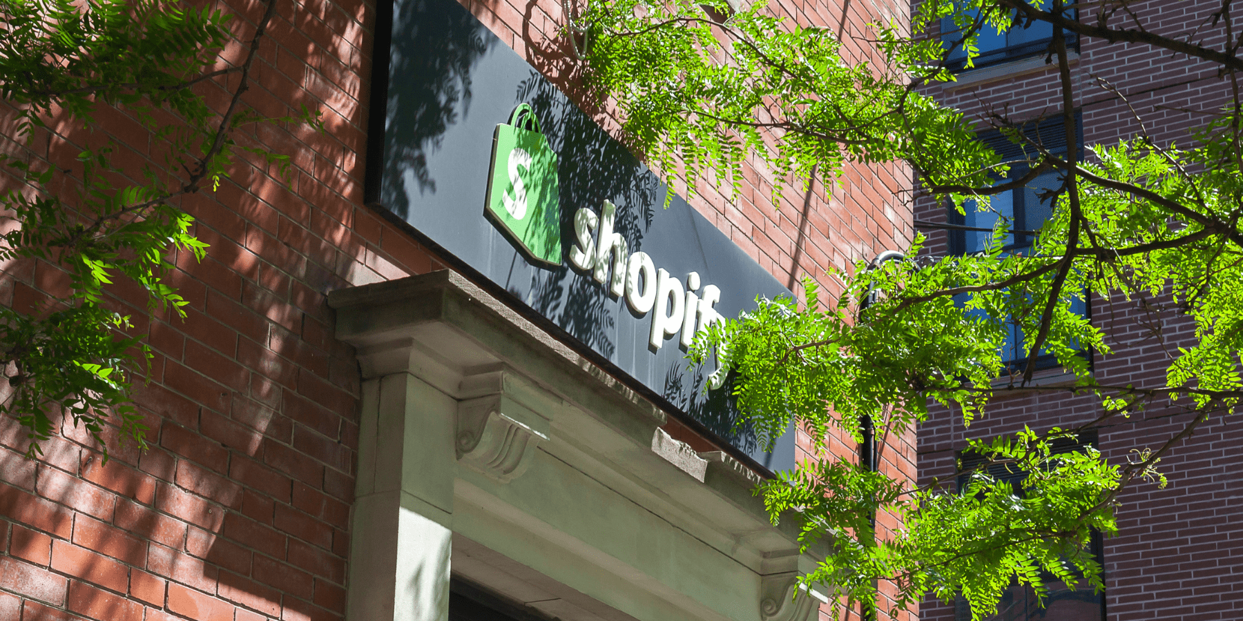 Turn Shopify Shipping Into A Growth Engine With ShipperHQ Shopify office front showcasing eCommerce innovations for optimized Shopify shipping